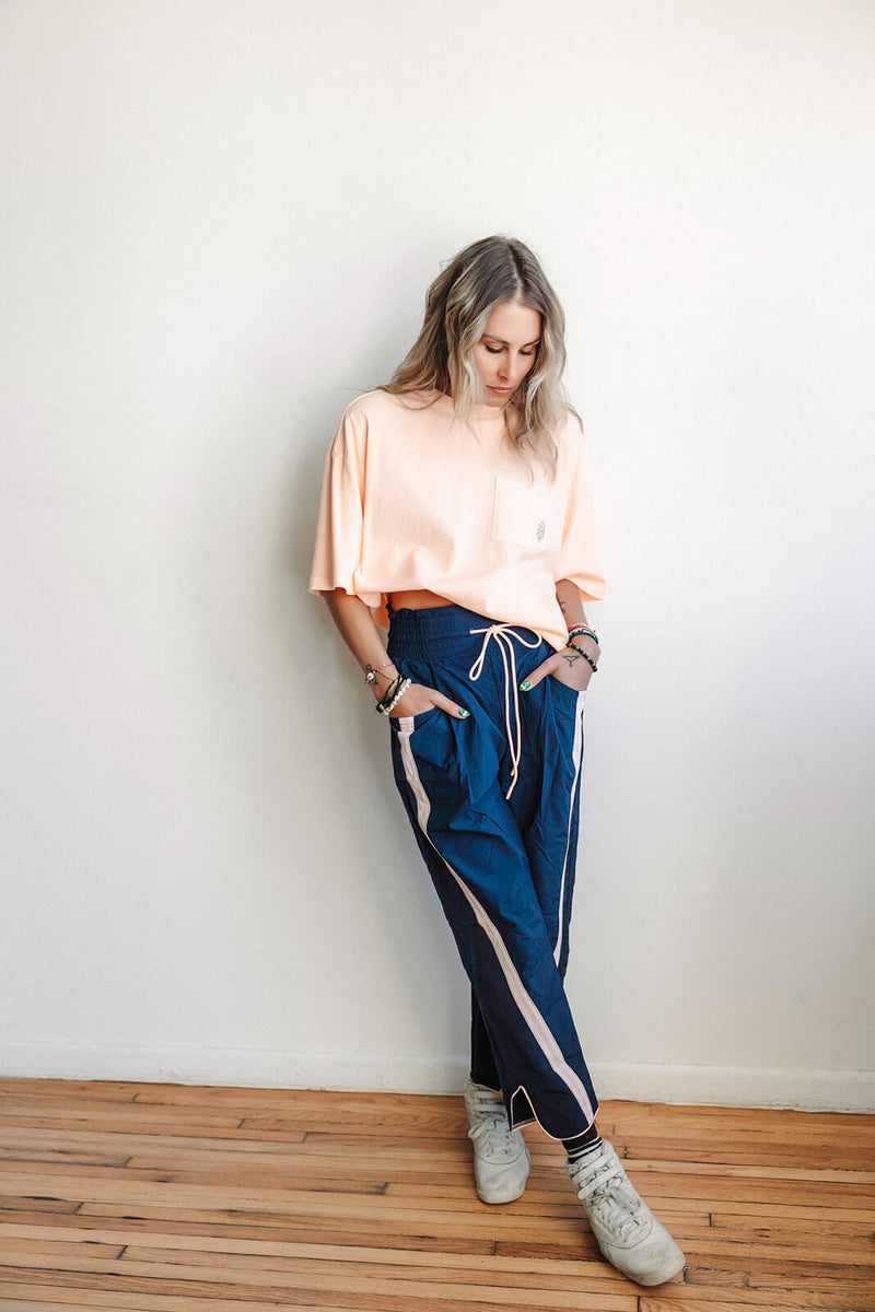arlo-free-people-movement-logo-tackle-tee-pastel-peach